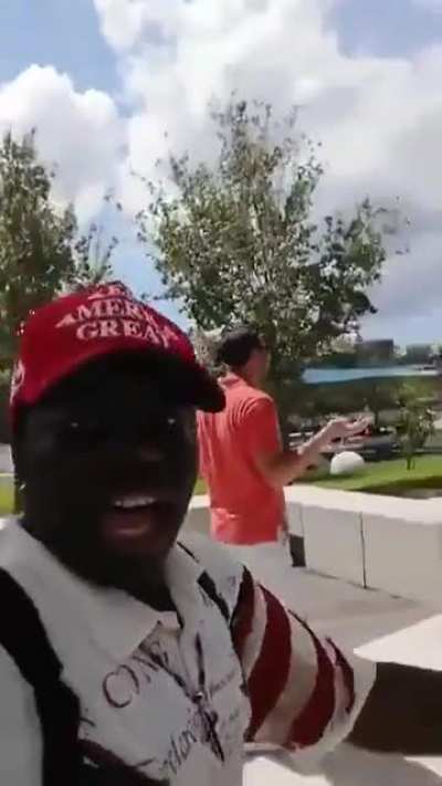 Black man melting White snowflakes.