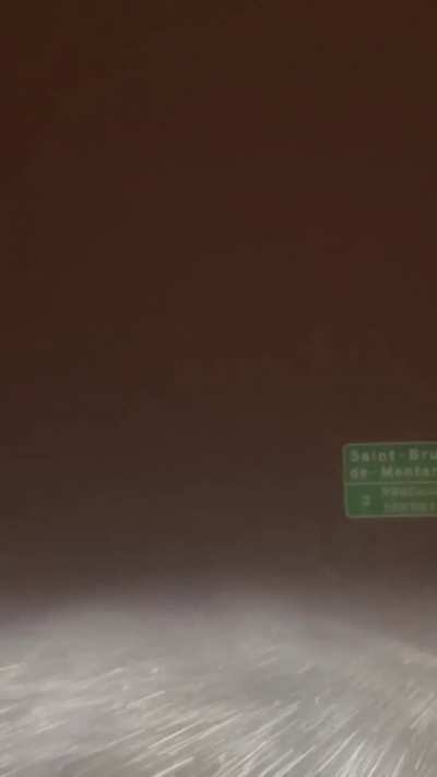 Getting home from work in the blizzard. This was on the highway.