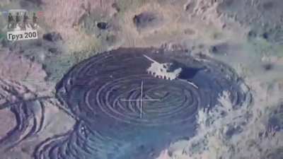 A Russian T-80BV tank was hit by Ukrainian fire, losing a track and with the crew killed/wounded- but the engine was still running, leading to a never ending collection of circles