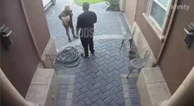 A white neighbor commands a black family to “Stop acting black” in their “White neighborhood” while holding a taser