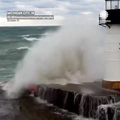 Lighthouse in a storm on Lake Michigan (Michigan City, USA, 21.10.2025).