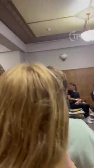 Dude loses his shit and attacks a projector after watching a meme with Kamala Harris
