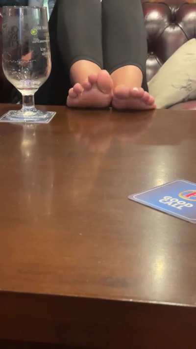 Teasing him in the pub as I know he loves pretty feet.