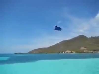 Kite surfing on a windy day. Wonder what could go wrong?