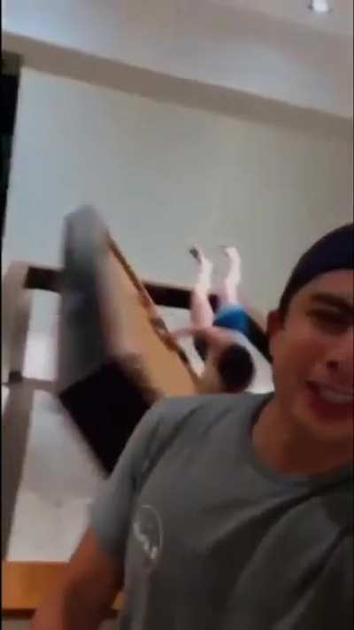 That girl trying to lie on the pool table.