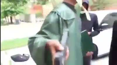 high school graduates showing off their glock<wbr>s..re<wbr>ally?