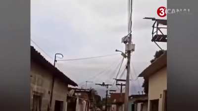 Plane flying close to the houses in Recife, Brazil