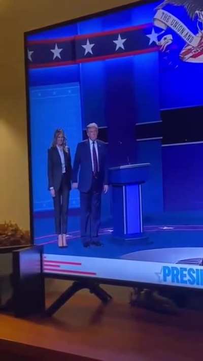Trump tries to get a little affection from his wife after he witnesses Joe get a hug from his wife.