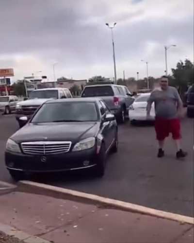 Liquor store parking lot brawl gets way out of hand.