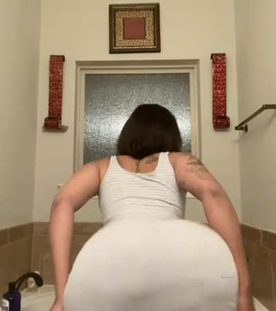 That sundress struggling to keep that ass tucked