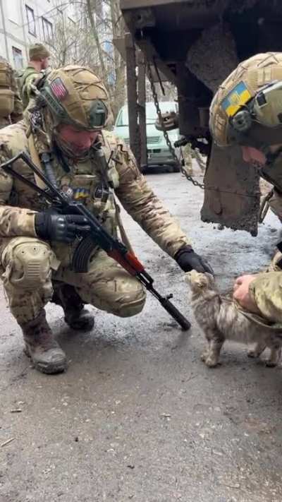 Soldiers enjoy a few moments of peace in Bakhmut