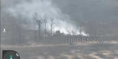 Russian drone footage of hitting a Bradley. Bradley is on fire but is able to manoeuvre