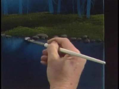 Bob Ross painting rocks like it’s nothing.