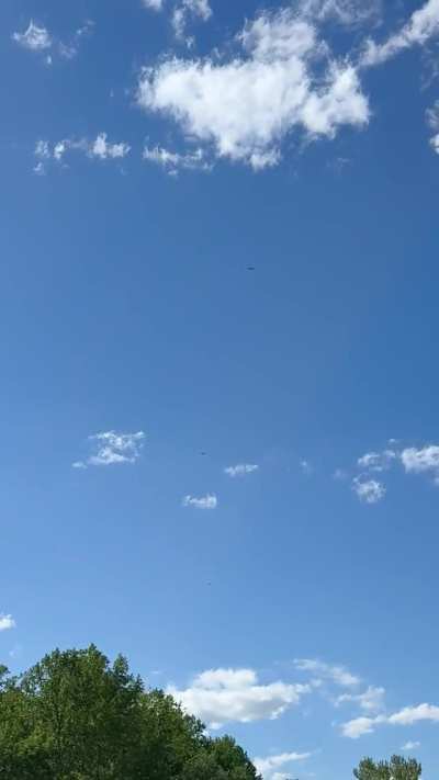 High-speed white object zips past over Sandy Hook, NJ (0:04 mark). Using the birds for scale, this thing is moving at incredible speeds.