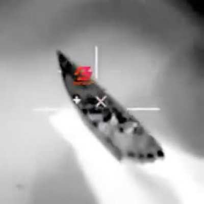In the video, we can see a small motorized boat, where fishermen throw nets into the sea to catch sardines. Then, the fishermen are seen diving into the water to swim with the sardines as they are being caught. A magical symbiosis between man and nature.
