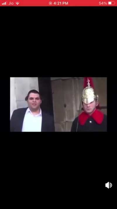 Wholesome guy makes the royal guard laugh.