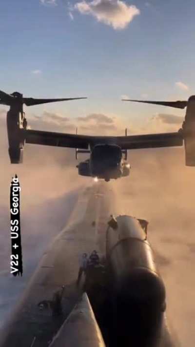 Ohio class USS Georgia (SSGN-729) & a hovering V-22 Osprey