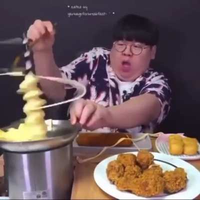 Man vs cheese fountain