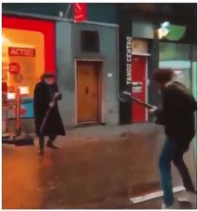 Old man starts rocking out with street performer
