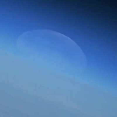 Amazing footage of the Moon setting beneath the Earth's horizon captured with a zoom lens from the International Space Station by cosmonaut Oleg Artemyev.