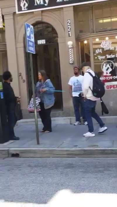 Baltimore Fiens - Junkie walking another Junkie in a leash