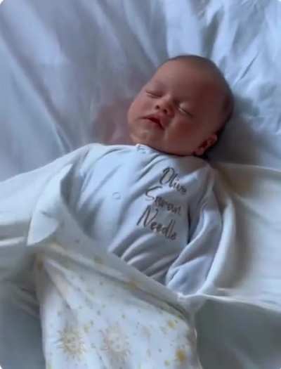 Adorable baby stretches