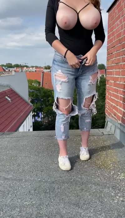 Revealing these huge tits to the whole city (OC)