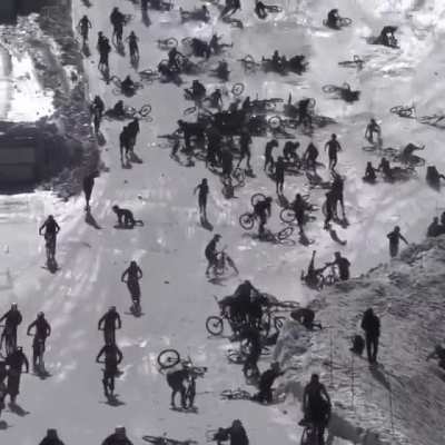 Bicyclists on a Ski Slope