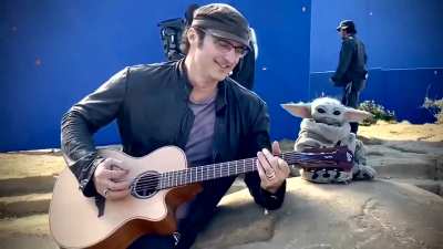 Baby Yoda Jamming with Director Robert Rodriguez at the Set of Mandalorian