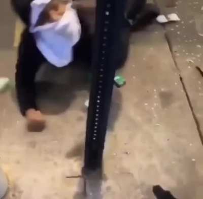 Store owner holds looter at gunpoint after he smashes his windows