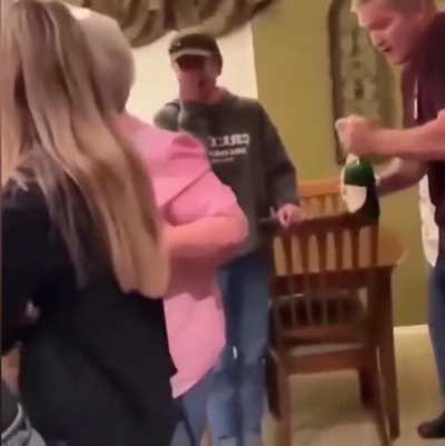 Not the smartest place to open the bottle