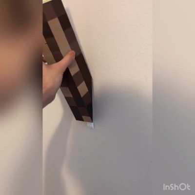 Designed and 3D printed an IRL wooden Minecraft torch for a buddy of mine