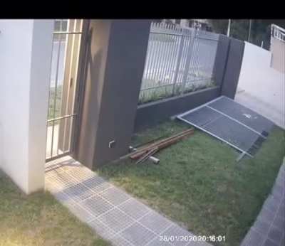 Heavy gate falls on the woman