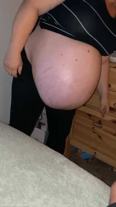 Wife’s giant belly. 