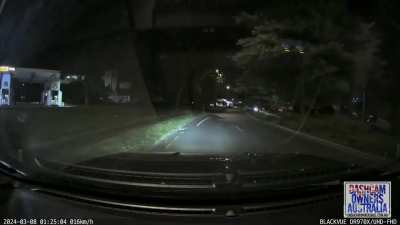 Car flies over roundabout, doesn't stick the landing