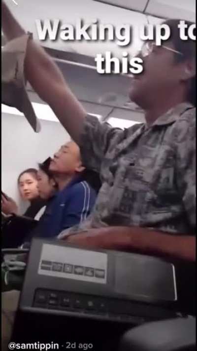 Man has a bit of an episode on the plane and starts singing