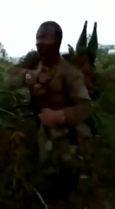 Infantry column advancing amid gunfire as Congolese Army battles M23 rebels