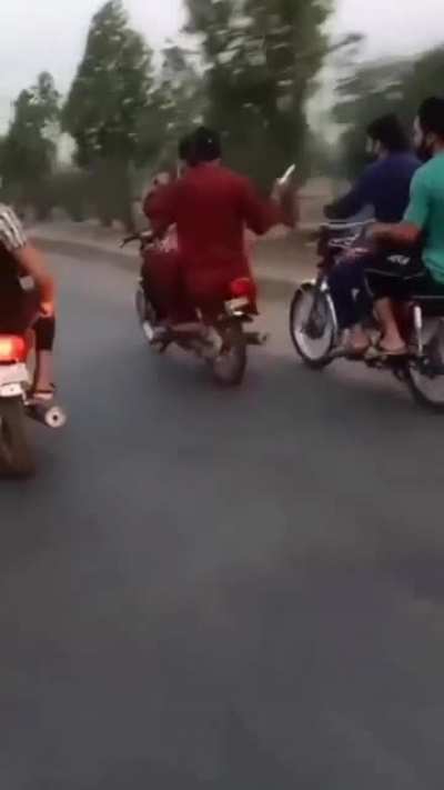 Riding a motorbike in Pakistan