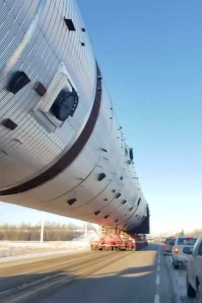 MANY trucks used to move this load. It weighed 800 tonnes and was the length of a football field.