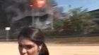 Tank explosion at a chemical factory sends a large piece of debris flying
