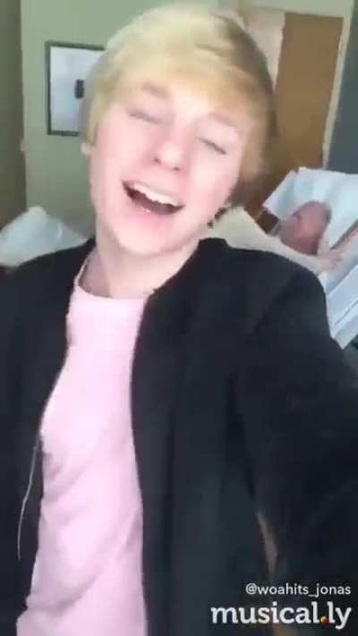 This kids's grandpa is actually dying while he is recording a musically, I did some research, and the grandpa died