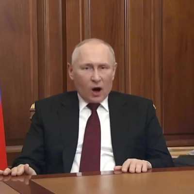 Putin singing the Ukrainian national anthem at a press conference
