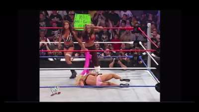 Torrie gets overconfident and ends up stripped to her undies. Melina quickly gets a taste of her own medicine after the bell