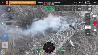 A Ukrainian FPV drone awaits the surrender of a russian soldier tangled up in barbed wire, he flips the drone off twice instead, upon which it engages him. November 2025.