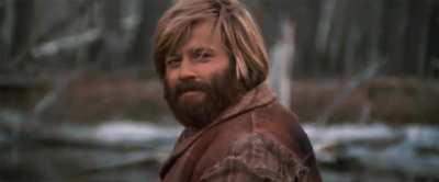 MRW I learned this is Robert Redford in a film called Jeremiah Johnson from 1972, not Zach Galifianakis