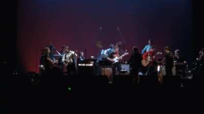 The Highwaymen (Willie Nelson, Johnny Cash, Waylon Jennings and Kris Kristofferson) and Reggie Young in 1990, performing 