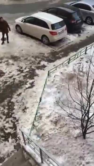 A guy jumped off a roof and hit a manhole.