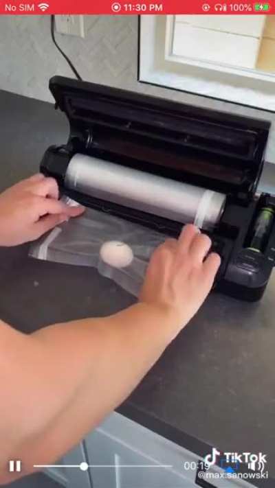 guy tries vaccuum sealing an egg
