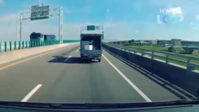 The styrofoam box just jumps back into the truck