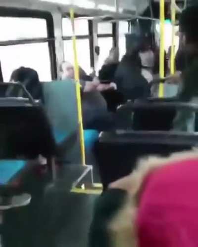 Mother of the year throws her offspring to a random stranger on the bus because she has to go fight someone